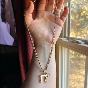 14K yellow gold Chai pendant with Avon Spiral Snail Scroll chain necklace